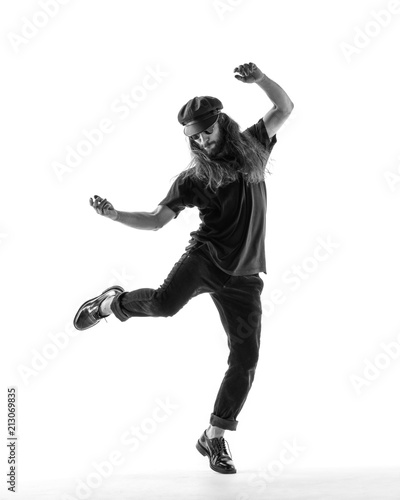 Young beautiful dancer posing in the studio