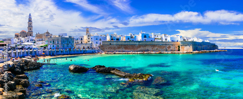 Beautiful white town Monopoli in Puglia with turquoise sea. Italy