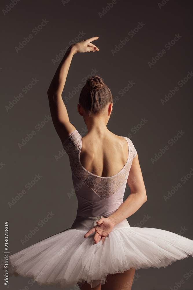 Young beautiful ballerina is posing in studio Young beautiful ballerina is posing in studio