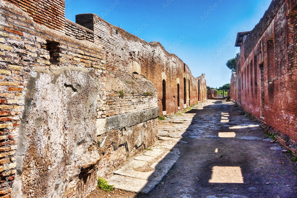Archaeological Roman empire street view in Ostia Antica - Rome - Italy
