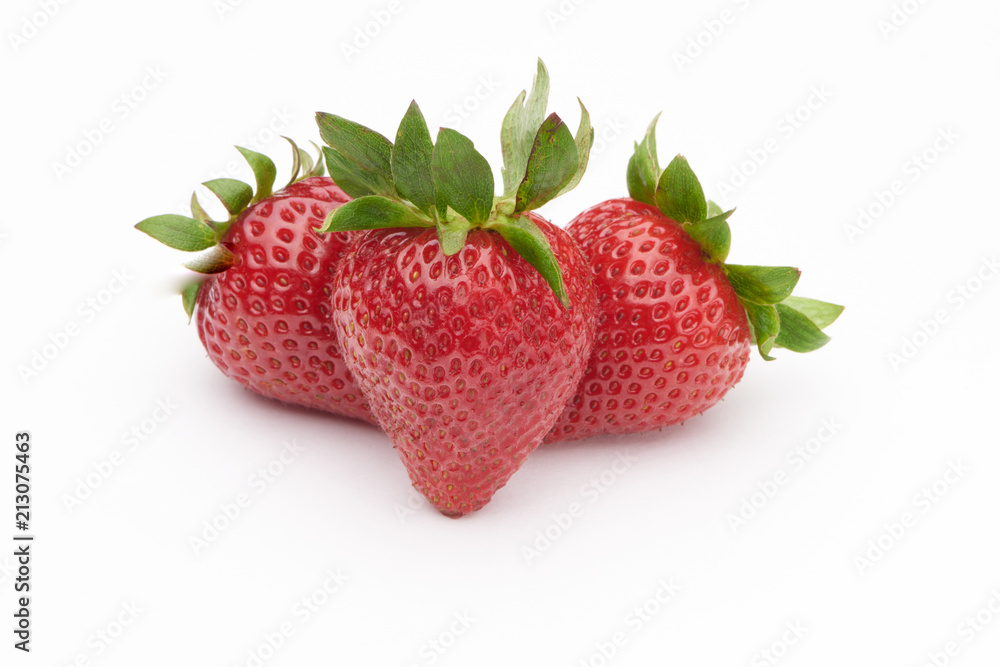 Fragrant, ripe strawberry on a white background Fragrant, ripe strawberry on a white background