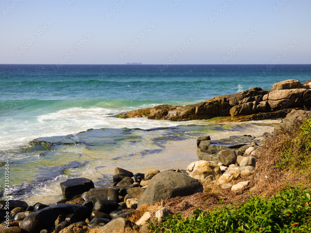 Rocky shore at Santinho beach - Florianopolis, Brazil Rocky shore at Santinho beach - Florianopolis, Brazil