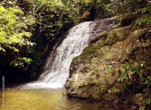 Small waterfall at Bohorok River in Bukit Lawang, Sumatra, Indonesia photo