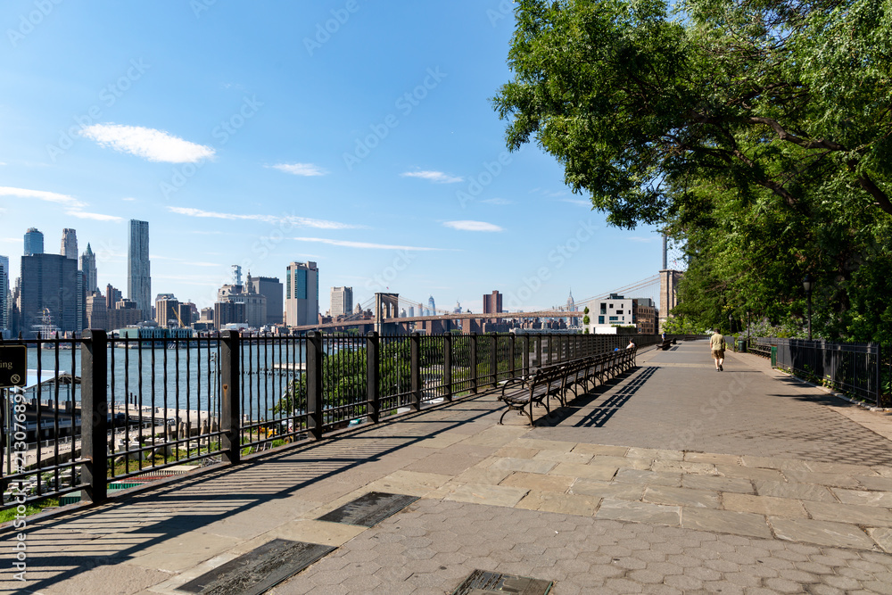 New York, City / USA - JUL 10 2018: Fort Stirling Park in clear afternoon of Lower Manhattan Skyline view from Brooklyn New York City