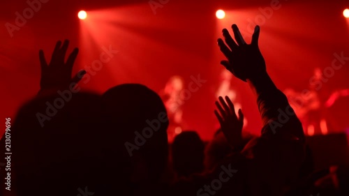 Croud lifting hands during worship