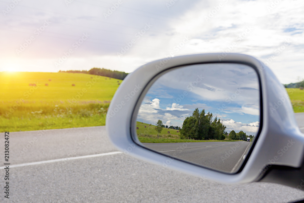 Fototapeta premium Reflection in the rear view mirror