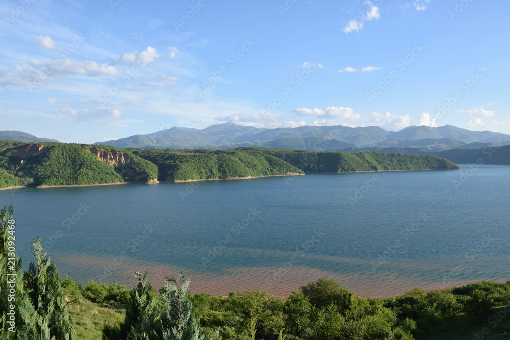 Debar Debarsko Lake in Macedonia, with mountains background.