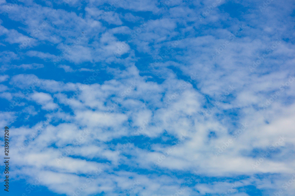 Fluffy White Clouds in Blue Sky Fluffy White Clouds in Blue Sky