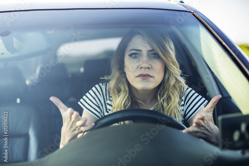 Картината върху платно Angry woman driving a car.