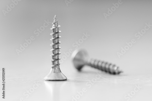 Screws, connect, fix, industry, thread. Monochrome detailed photo.
