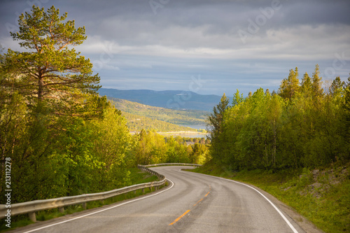 Mountain road and beautiful sky in sunny day in Norway