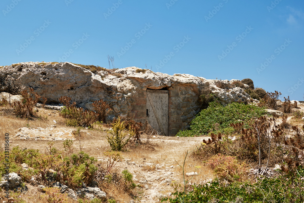 Fototapeta premium Door in the rock. Dingli. Malta