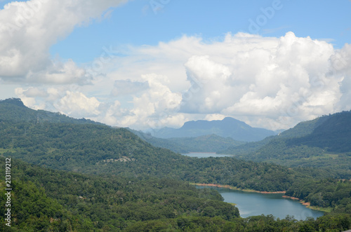 Mountain landscape in a green valley with the villages. View of Kotmale Reservoir, Sri Lanka.
