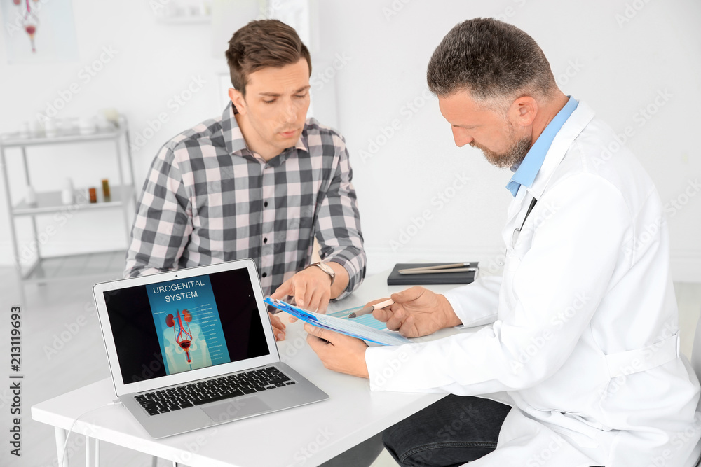Fototapeta premium Man with health problems visiting urologist at hospital