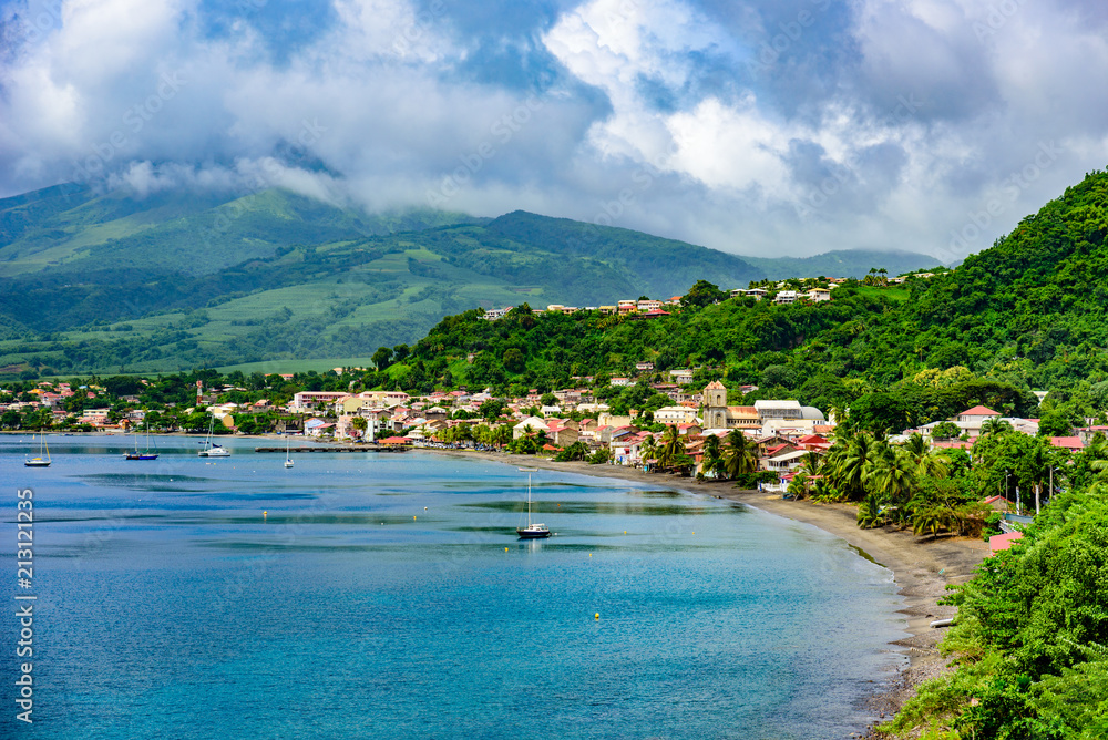 Paradise coast at Saint Pierre with Mt. Pelee, active volcanic mountain in Martinique, Caribbean Sea