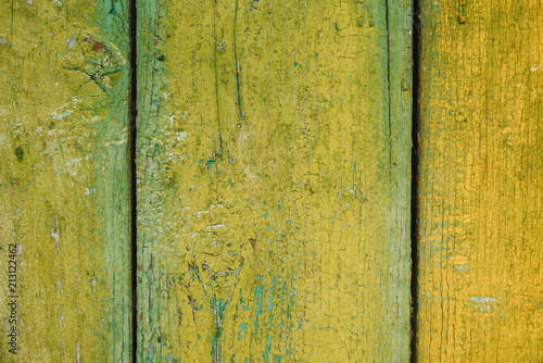 Wooden wall background or yellow and green textures