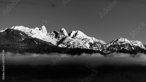 The Lions overlooking Vancouver, Canada from the banks of the Fraser River