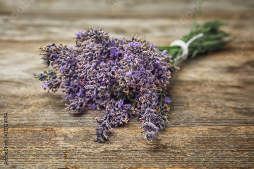 Beautiful blooming lavender flowers on wooden table