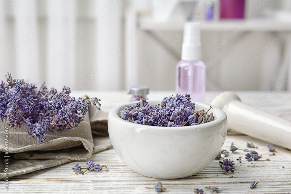 Composition with lavender flowers and natural cosmetic on table Composition with lavender flowers and natural cosmetic on table