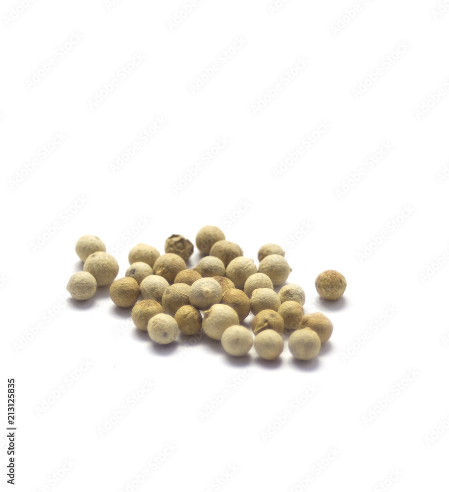 Stack of black pepper on white background Stack of black pepper on white background