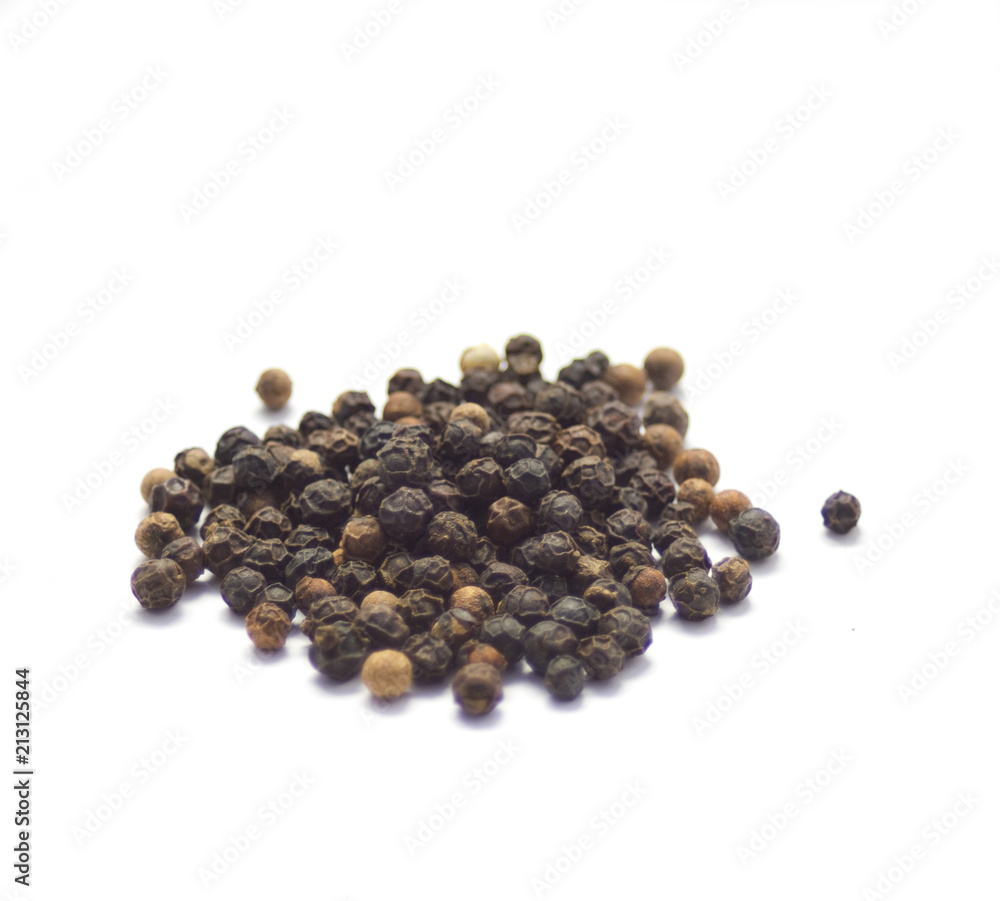 Stack of black pepper on white background Stack of black pepper on white background