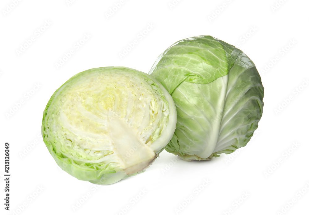 Whole and sliced cabbages on white background. Healthy food Whole and sliced cabbages on white background. Healthy food