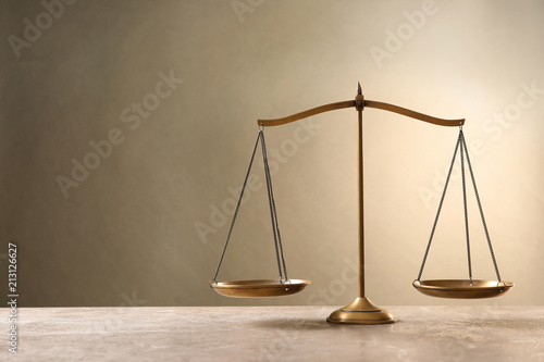 Tablou canvas Scales of justice on table. Law concept