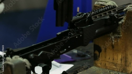 Assembling weapons in the workplace. Assaul rifles. Close up view