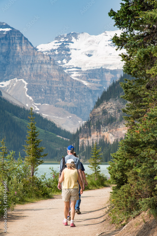 A Man and Woman Hiking On the Trail Around Lake Louise, Banff, Alberta, Canada