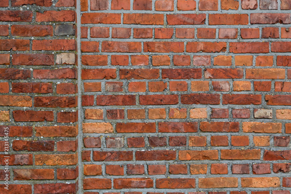 Fototapeta premium Two Adjoining Running Bond Red Brick Walls