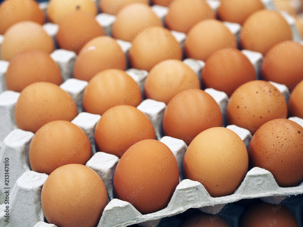 a tray of chicken eggs from organic farm selling in grocery shop a tray of chicken eggs from organic farm selling in grocery shop
