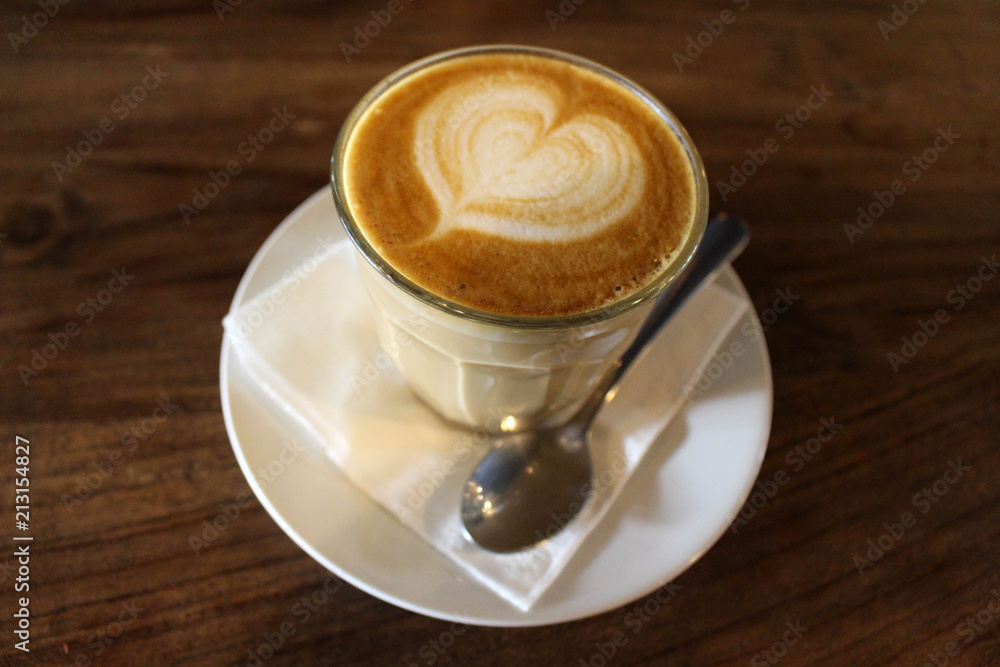 A cup of hot cafe latte (plus its latte art) A cup of hot cafe latte (plus its latte art)