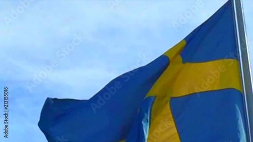 Swedishflag wawing in the wind photo