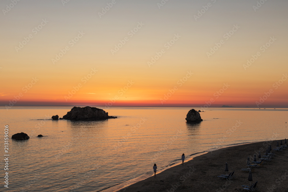 Prasoudi beach at dusk, Corfu island, Greece Prasoudi beach at dusk, Corfu island, Greece