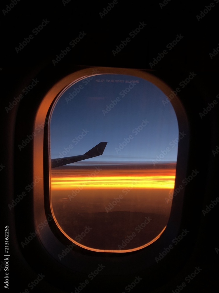 Fototapeta premium Sunrise at airplane