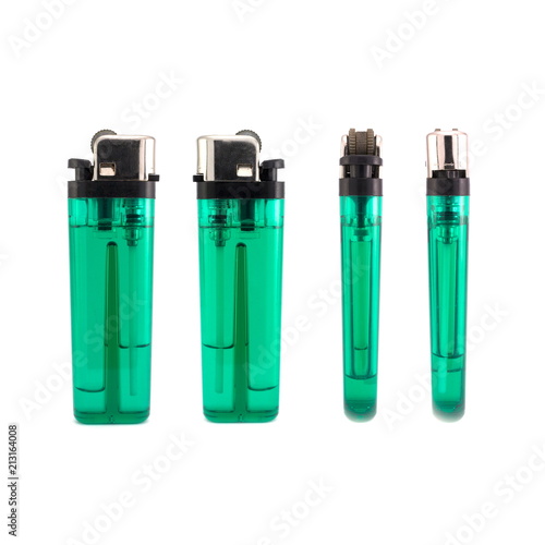 Green gas plastic lighters isolated on white background