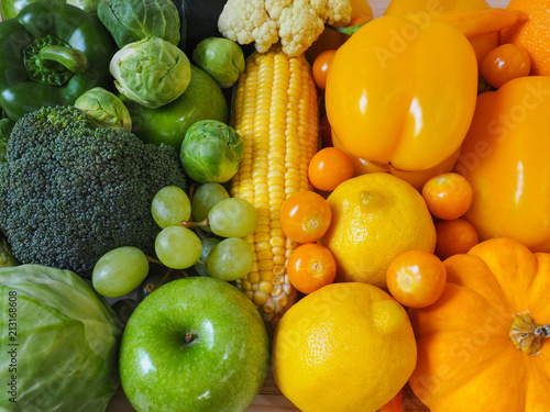 Colorful fresh fruits and vegetables background, healthy eating concept.