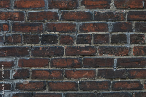 Old and Worn Exterior Brick Wall