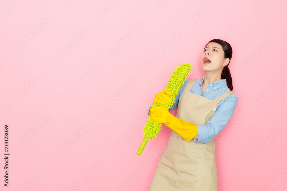 woman imitate the feather stick as the microphone woman imitate the feather stick as the microphone
