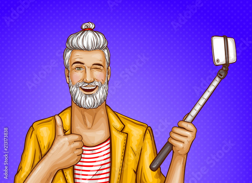 Vector smiling old man with selfiestick, happy gray-haired hipster in trendy jacket shows thumb up and makes photo by smartphone. Cartoon character isolated on purple dotted background.