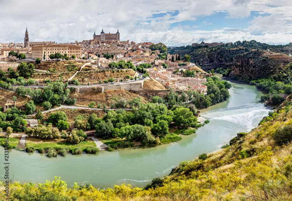 Panoramic view of the historic city of Toledo with river Tajo, Spain.