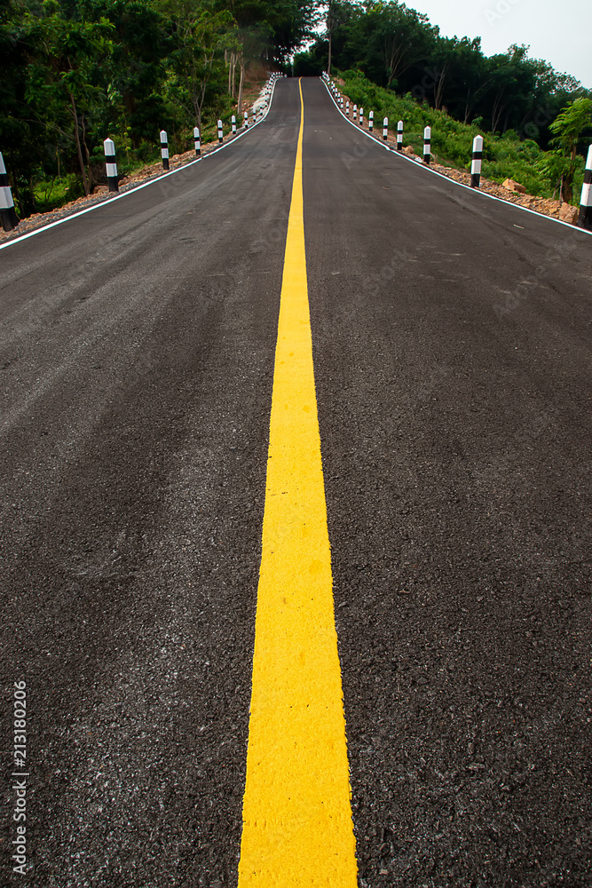 Yellow line on the road.