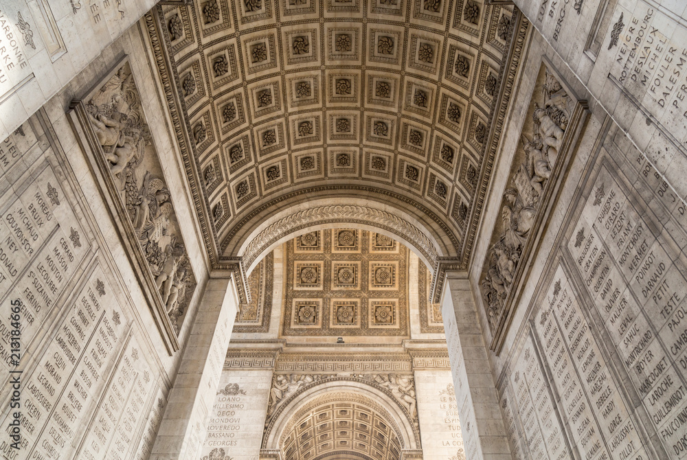 The Arc de Triomphe in Paris as seen from under the arc