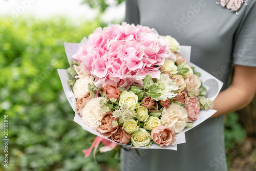Wallpaper Mural beautiful spring bouquet. flower arrangement with hydrangea and peonies. Color light pink. The concept of a flower shop, a small family business Torontodigital.ca
