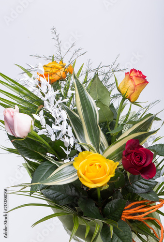 Bouquet of assorted multicolored roses isolated on white background