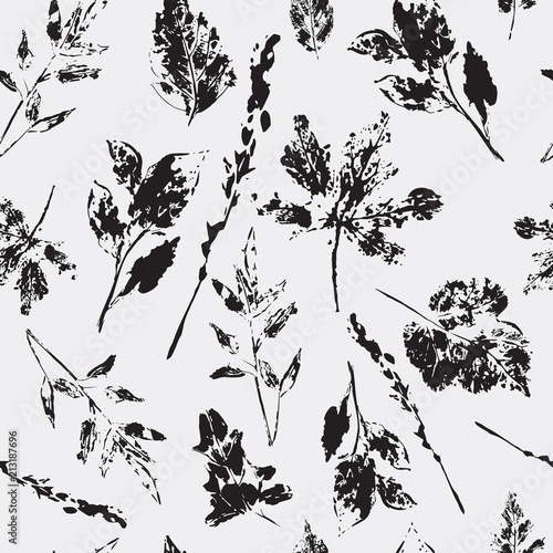 Seamless pattern with stamp leaves and branches. Vector texture