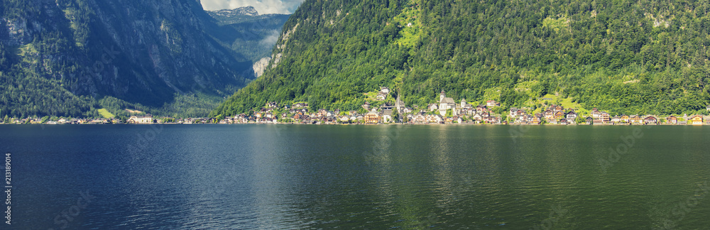 Scenic view of famous Hallstatt mountain village with Hallstatter lake