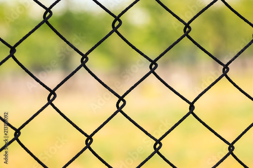Close up on a pattern of chain link fence