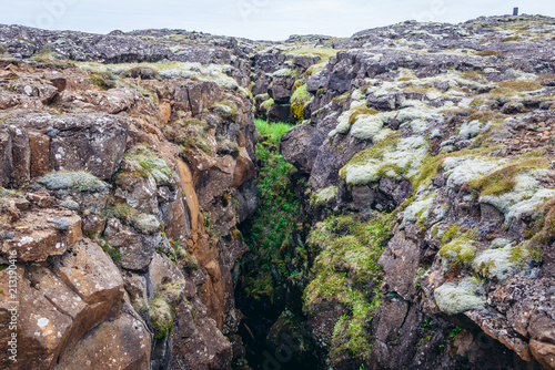 Rock fissure seen from a route number 425 along shore of North Atlantic Ocean at Reykjanes Peninsula in Iceland