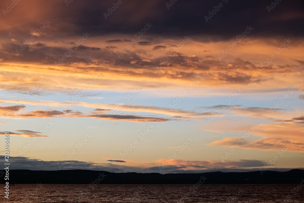 sunset over lake - painted sky golden shine feathers of angels - Balaton lake, late sunset, dark tones